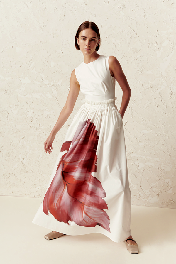 white and red long skirt and white top