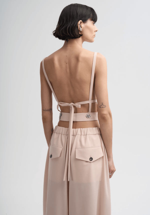 woman top and pants pink