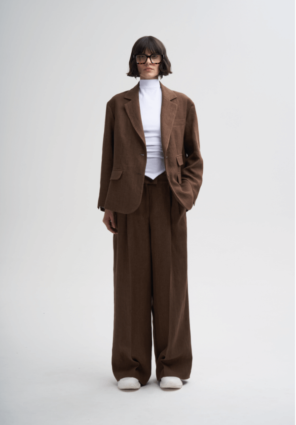 woman suit brown