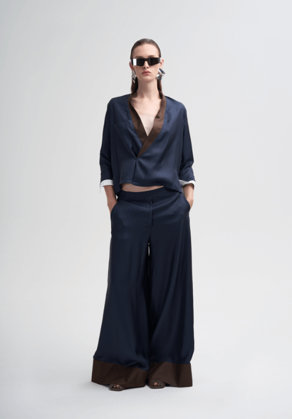 woman dark blue pants and blouse